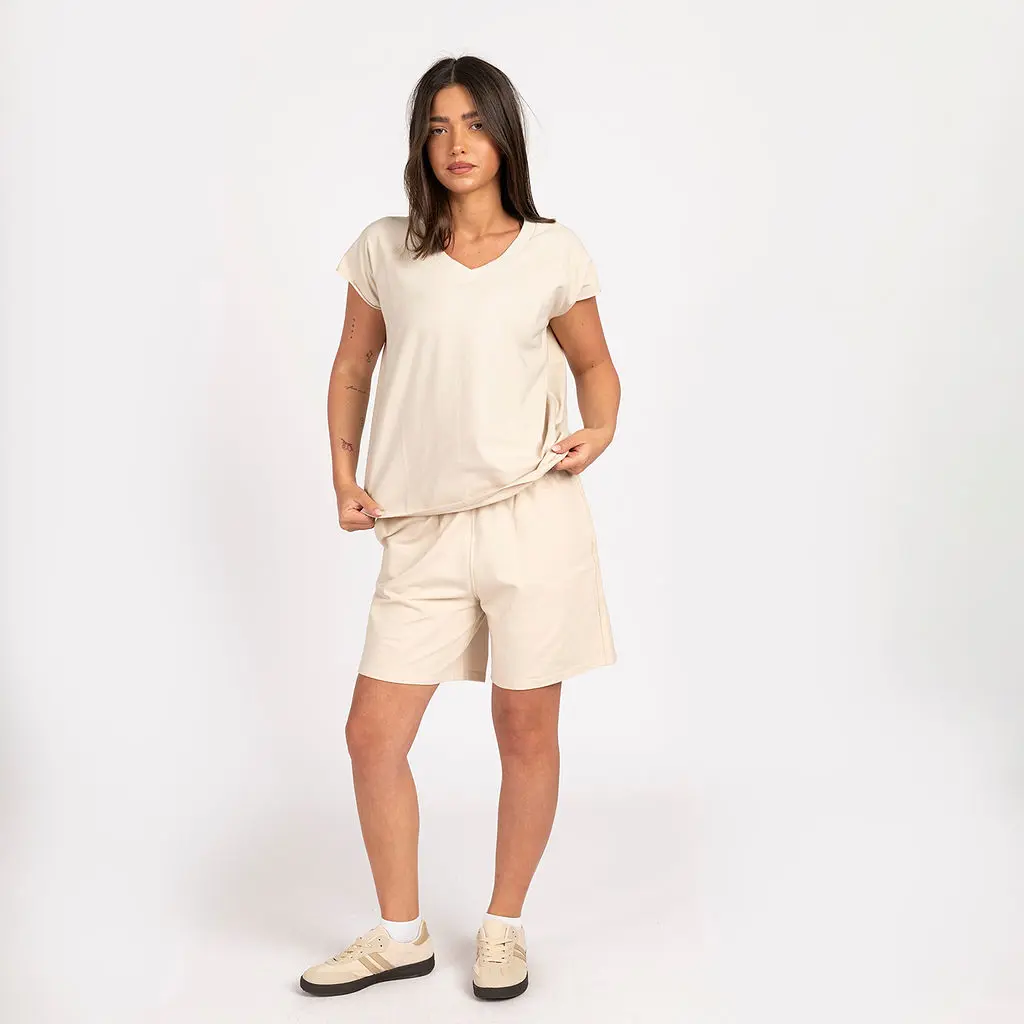 מכנסיים וחצאיות בז L